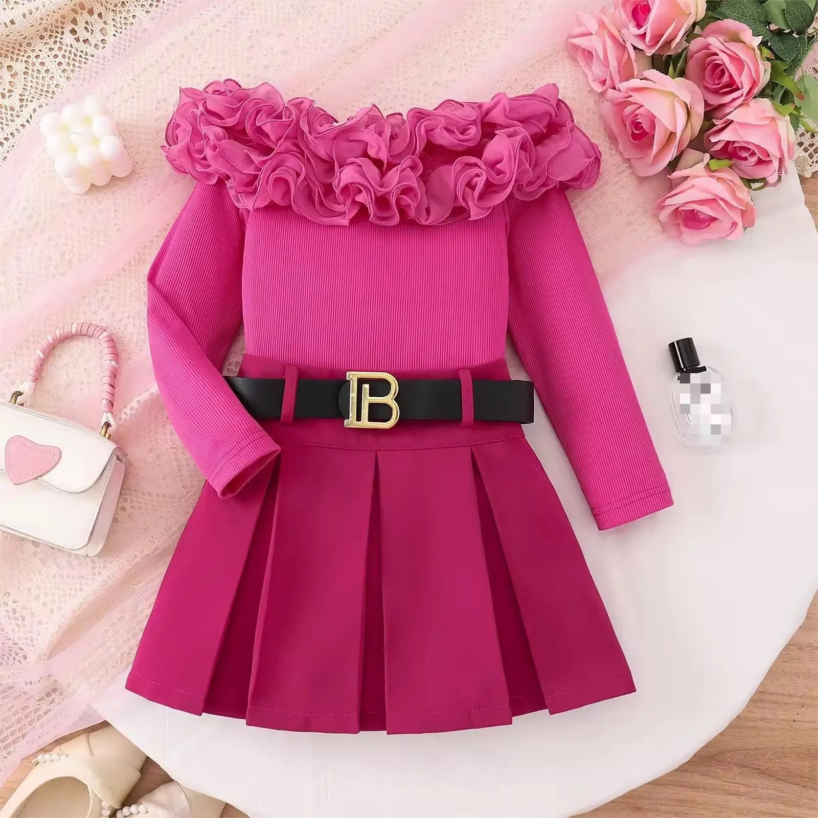 Girls Pink Ruffle Top And Pleated Skirt