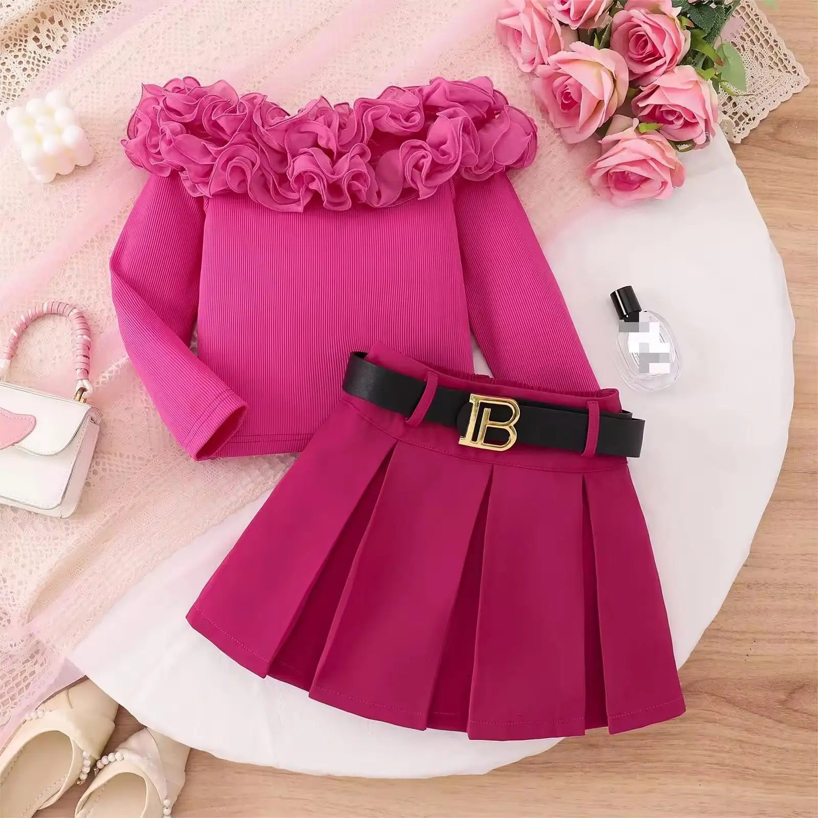 Girls Pink Ruffle Top And Pleated Skirt